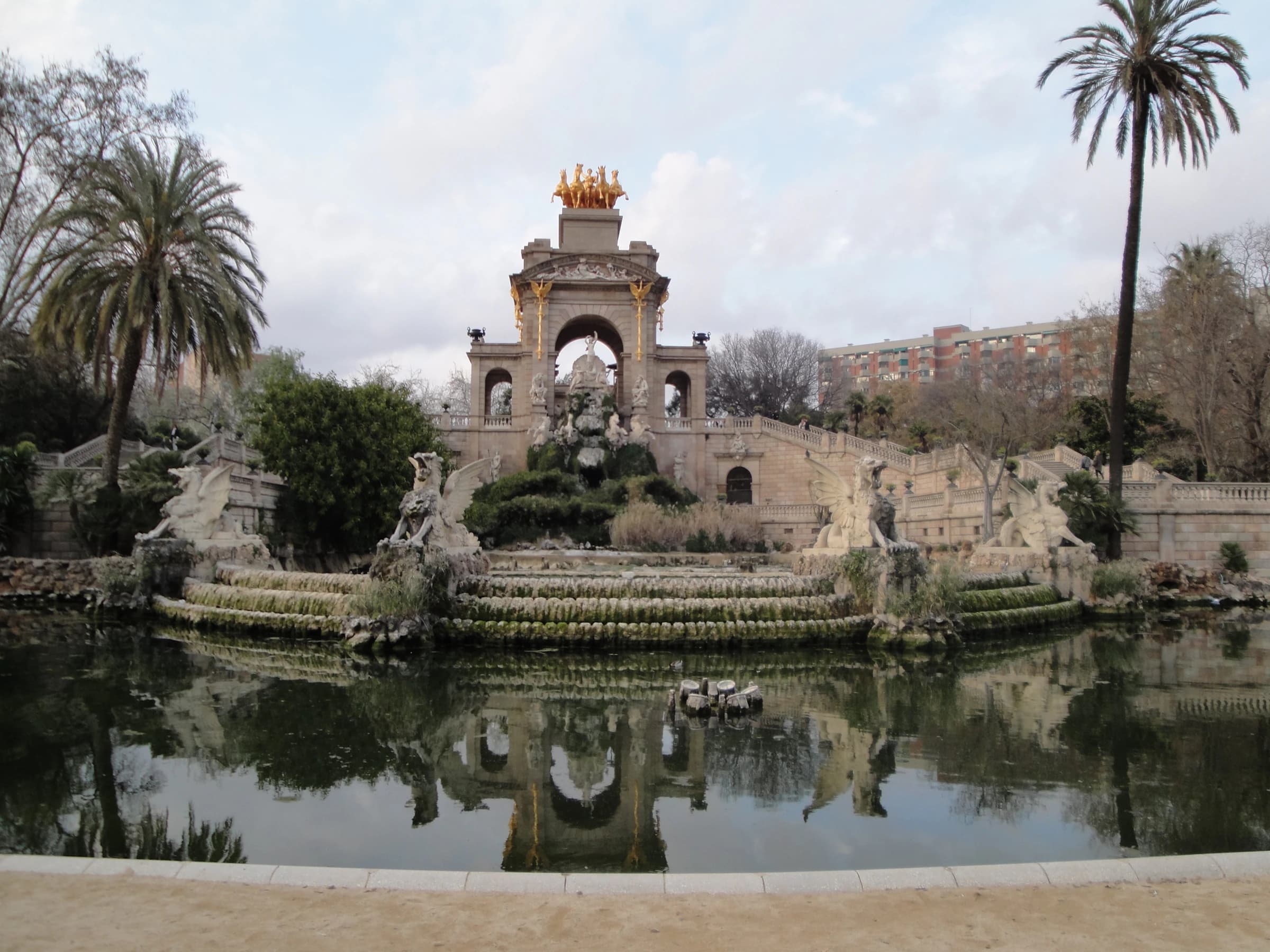 The monumental cascade reflected in the pond of Parc de la Ciutadella