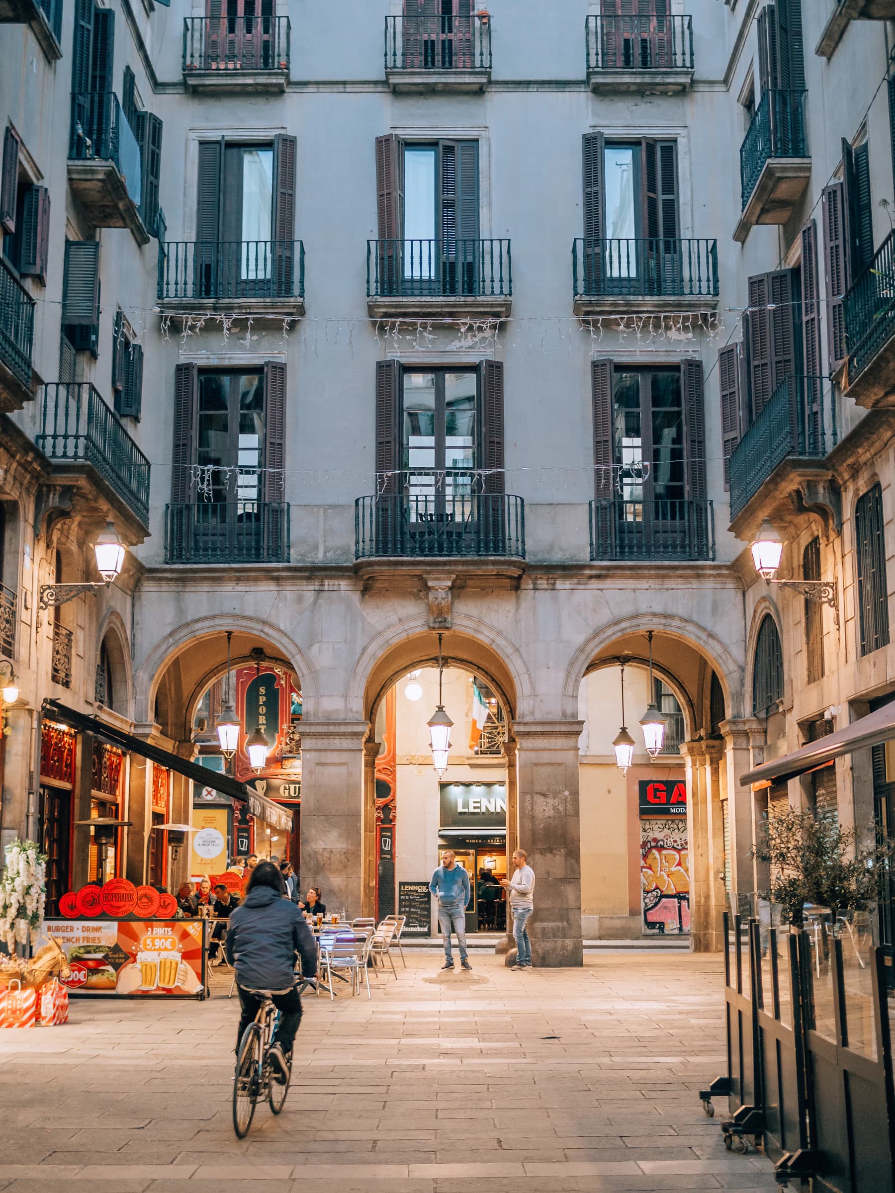 Arcades and façades surrounding a courtyard in Barcelona’s Gothic Quarter